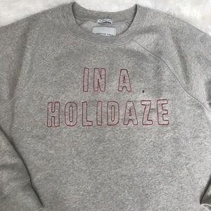 in a holidaze sweatshirt american eagle